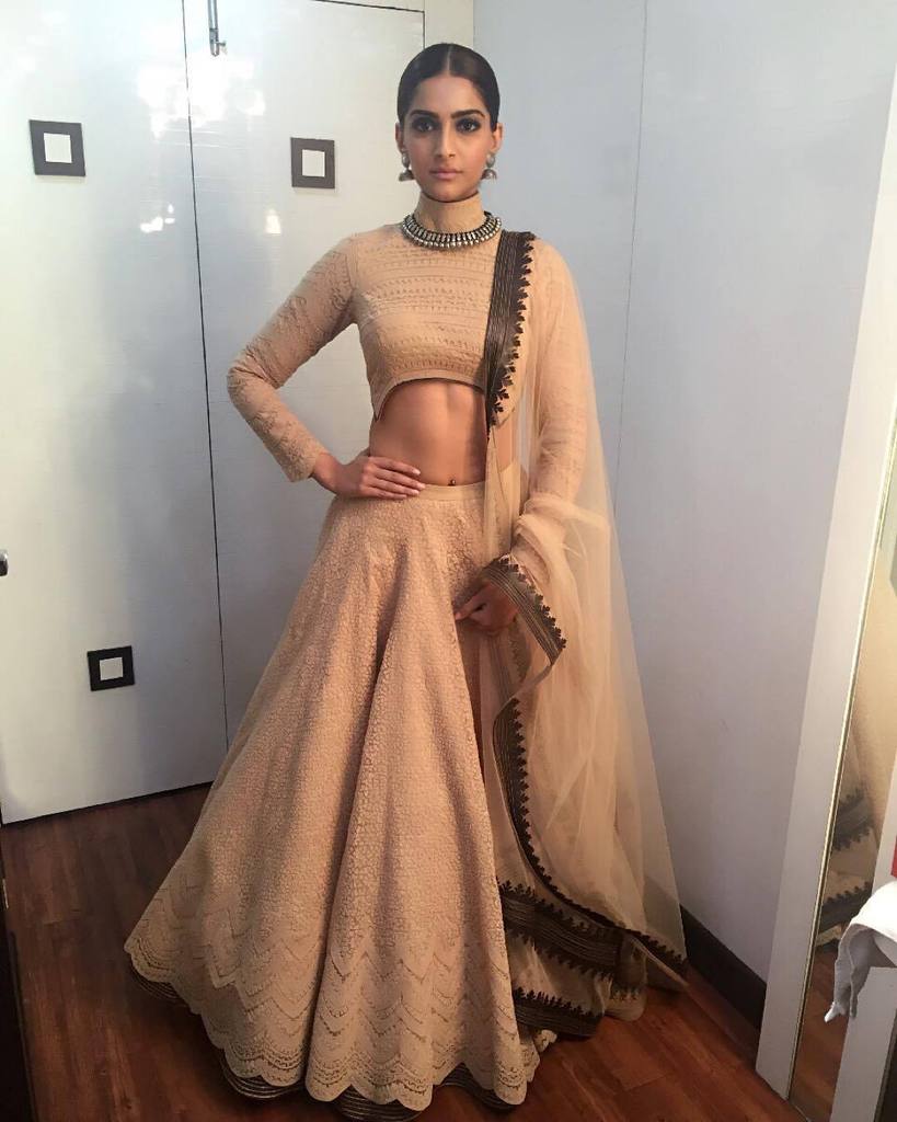 sonam kapoor stylish looks in sarees, suits and off- shoulder