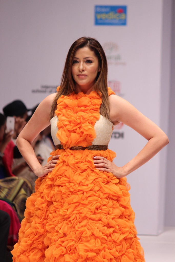 Actress Aditi Gowitrikar walked the ramp for Designer Megha Jain