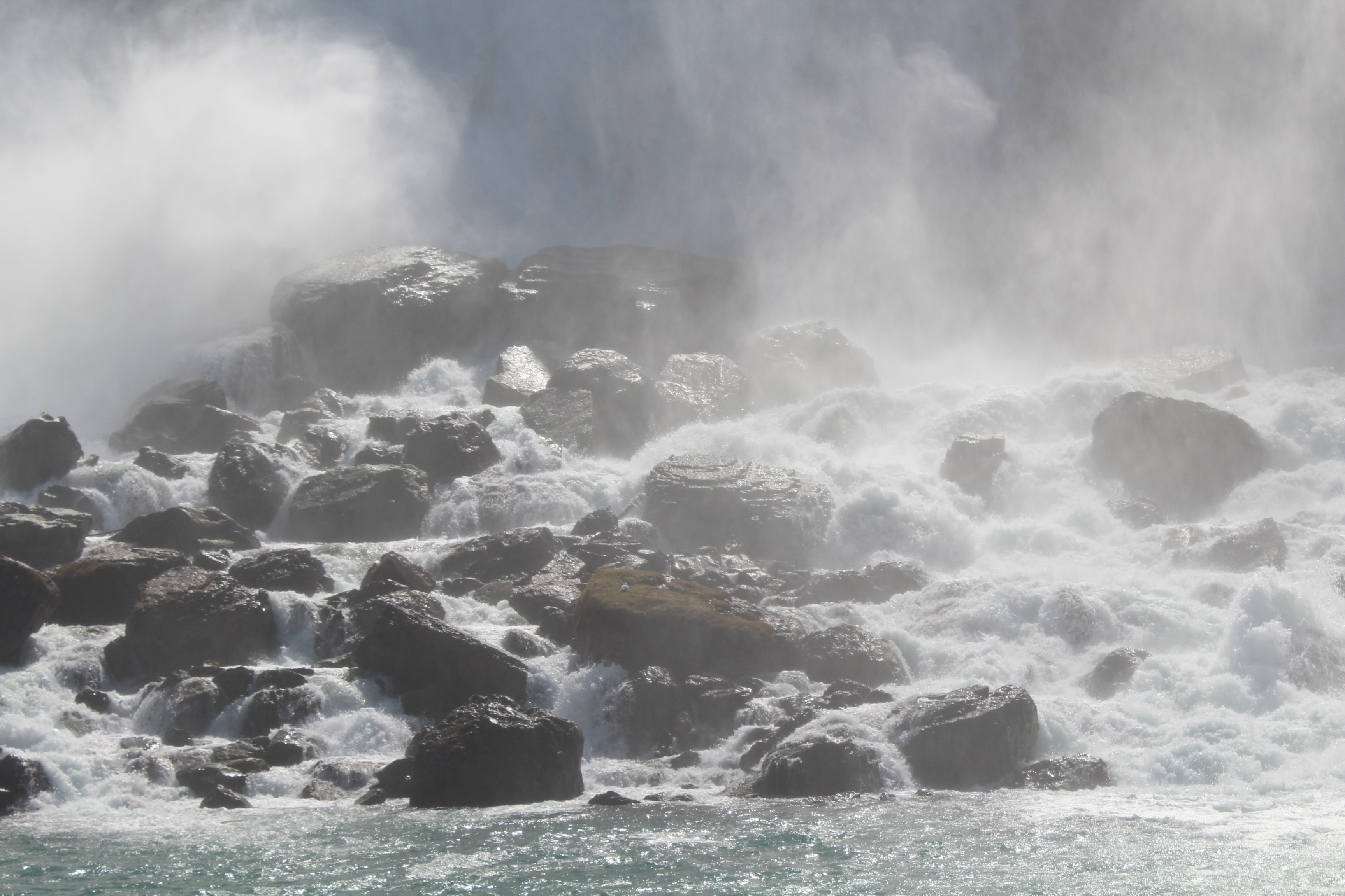 Splashing Niagra Falls water on the stones